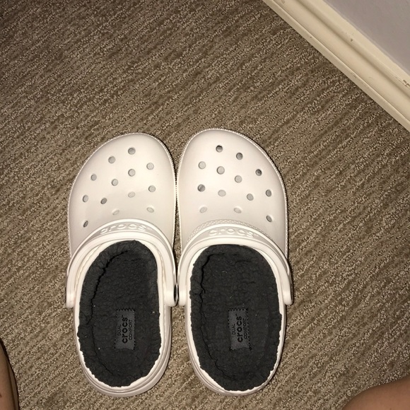 white crocs with grey fur